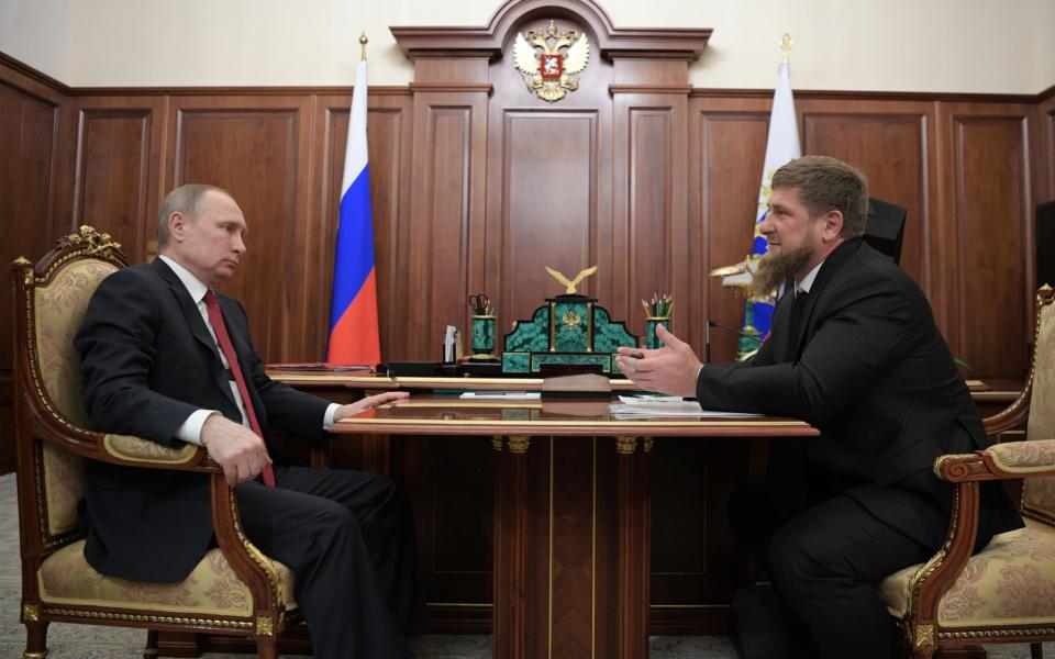 Vladimir Putin with Ramzan Kadyrov during a meeting at the Kremlin on Wednesday - Credit: TASS via Getty Images