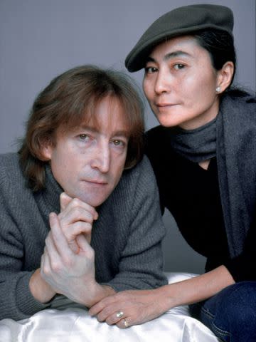 <p>Jack Mitchell/Getty </p> John Lennon and Yoko Ono photographed in November 1980