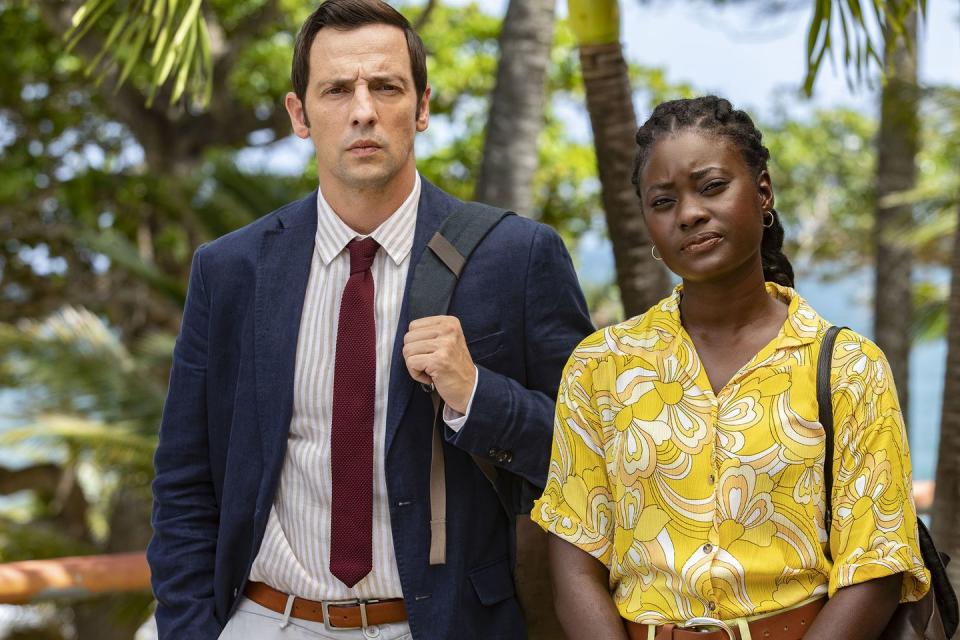 ralf little and shantol jackson as neville parker and naomi thomas in death in paradise