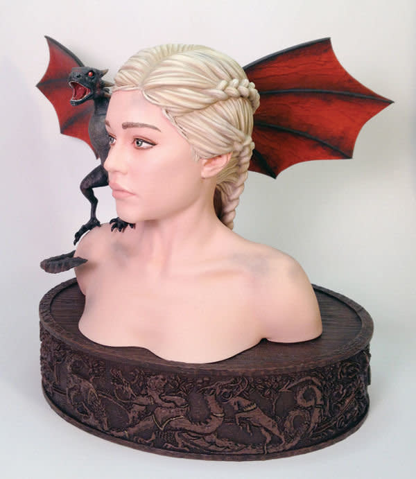 "<a href="http://www.darkhorse.com/Products/20-498/Game-of-Thrones-Daenerys-Bust" target="_blank">She is depicted</a> with a newly hatched baby dragon on her shoulder."