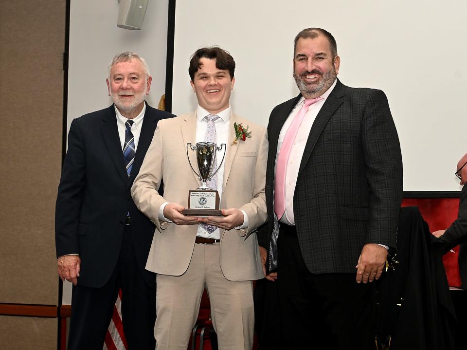 From left, William McInturff, Somerset Board of Education Chairperson; Zachary D. Bartemy, SCPS’ 2024-2025 Teacher of the Year; and John Gaddis, Superintendent of Somerset County Public Schools,
