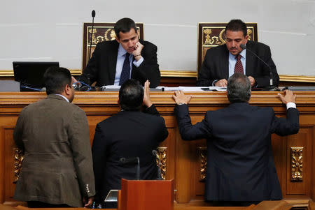 Venezuelan opposition leader and self-proclaimed interim president Juan Guaido attends a session of the Venezuela's National Assembly in Caracas, Venezuela January 29, 2019. REUTERS/Carlos Garcia Rawlins