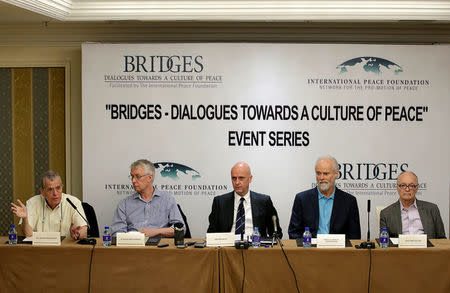 Nobel laureate Aaron Ciechanover (L) speaks as he attends a news conference with two other laureates, Finn Kydland (R) and Richard Roberts (2nd L), Prince Alfred of Liechtenstein (2nd R) and Uwe Morawetz, founding chairman of International Peace Foundation in Beijing, China, May 7, 2016. REUTERS/Jason Lee