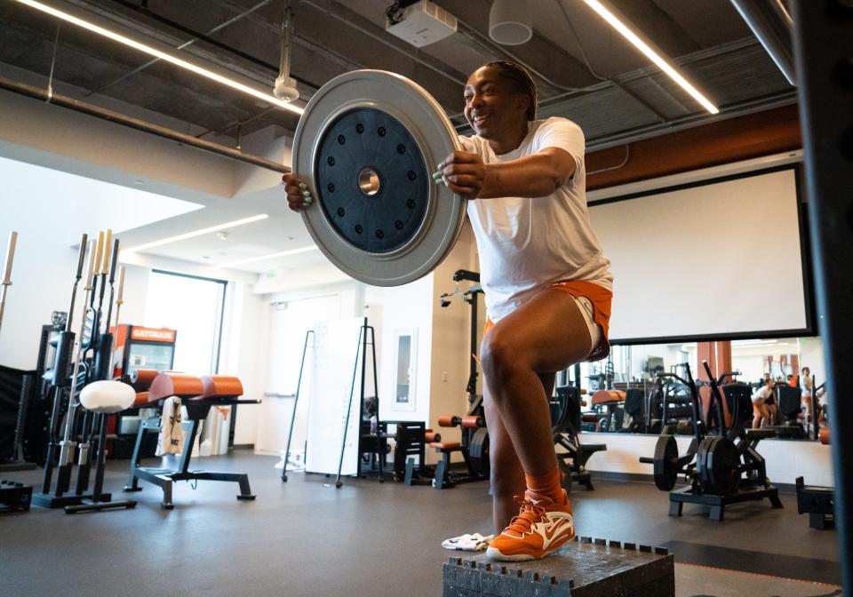 Tionna Herron works out in the weight room with her University of Texas basketball teammates last month. Herron underwent surgery for a heart abnormality, causing her to miss a year, but is hoping to get back in games this year.