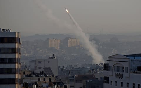 Shops and schools were closed in Tel Aviv for the first time since 2014 as Palestinians fired rockets - Credit: REUTERS/Mohammed Salem