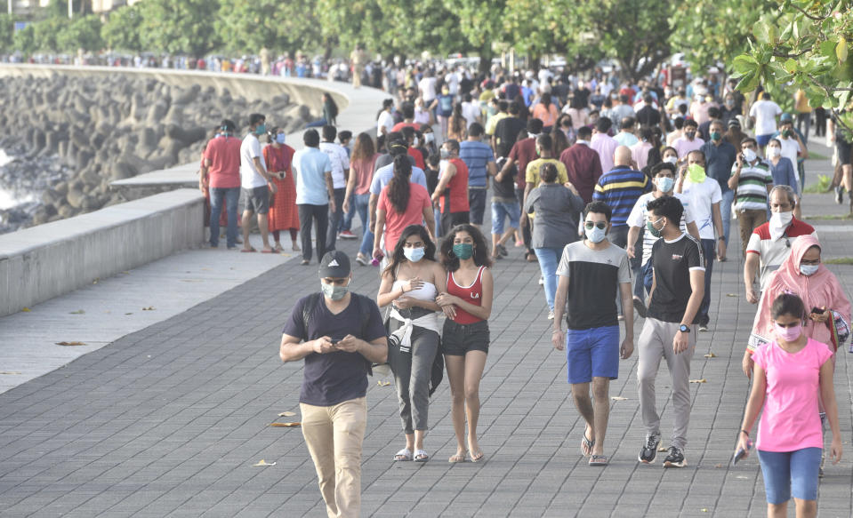 MUMBAI, INDIA - JUNE 7: Huge crowd walks at Marine drive during the first phase of Unlock 1.0, on June 7, 2020 in Mumbai, India. (Photo by Satyabrata Tripathy/Hindustan Times via Getty Images)