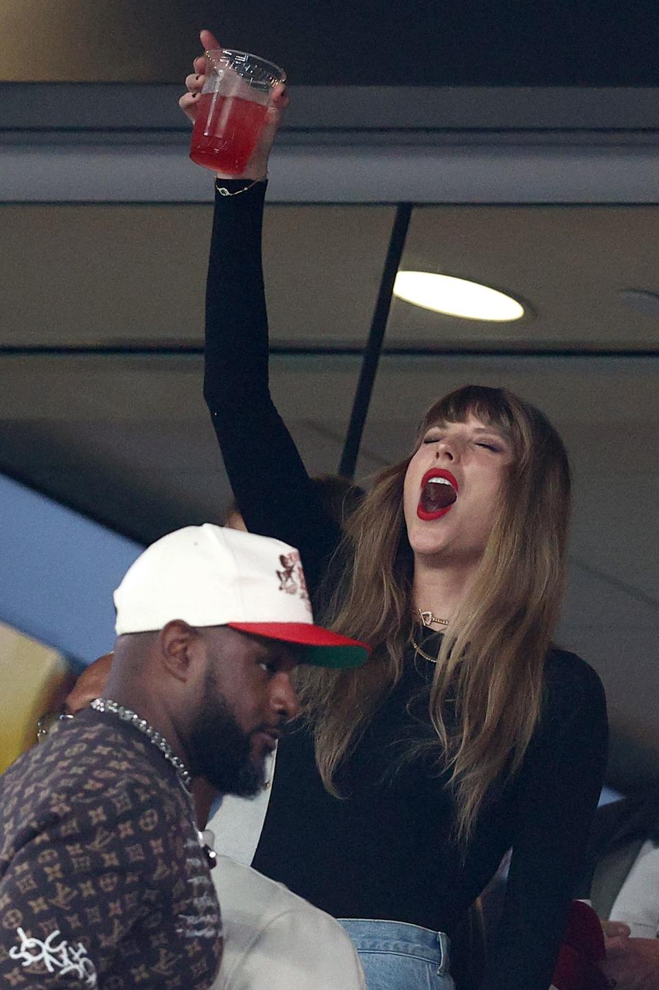 Taylor Swift was in the game day spirit to kick off the game.