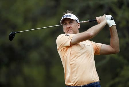 Mar 24, 2018; Austin, TX, USA; Ian Poulter of England plays against Louis Oosthuizen of South Africa during the fourth round of the WGC - Dell Technologies Match Play golf tournament at Austin Country Club. Mandatory Credit: Erich Schlegel-USA TODAY Sports