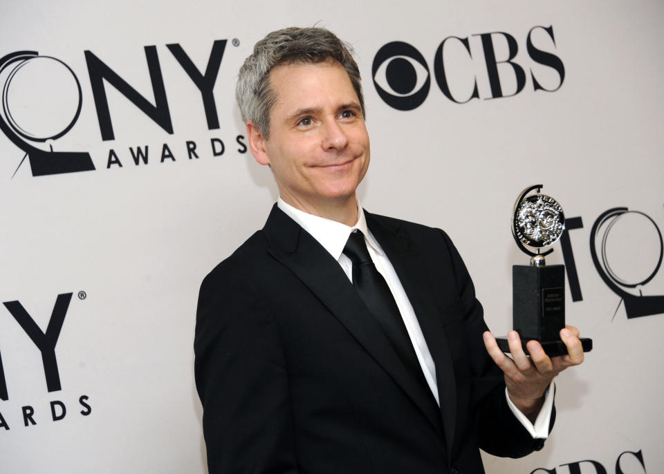 FILE - In this June 10, 2012 file photo, Bruce Norris poses with his Best Play award for "Clybourne Park" in the press room at the 66th annual Tony Awards, in New York. The Pulitzer Prize-winning playwright of "Clybourne Park" says he withdrew permission for a Berlin theater company to produce the play after learning that one of the actors would perform the roles in blackface. (Photo by Evan Agostini /Invision/AP, File)
