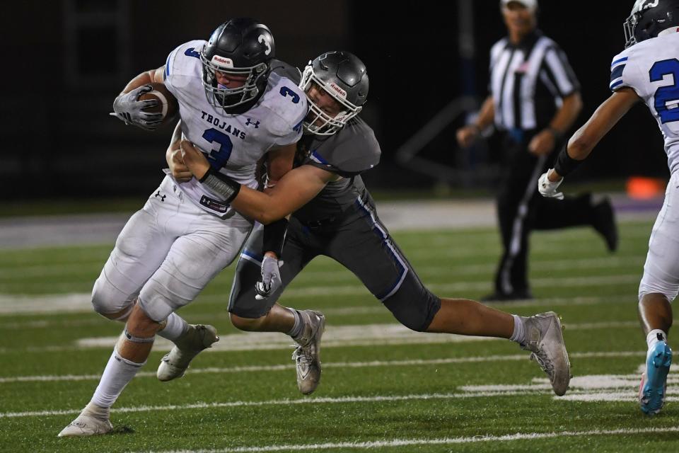 West Central's Crew Heier (3) gets tackled at USF Sports Complex in Sioux Falls, South Dakota on Friday, Sept. 1, 2023.