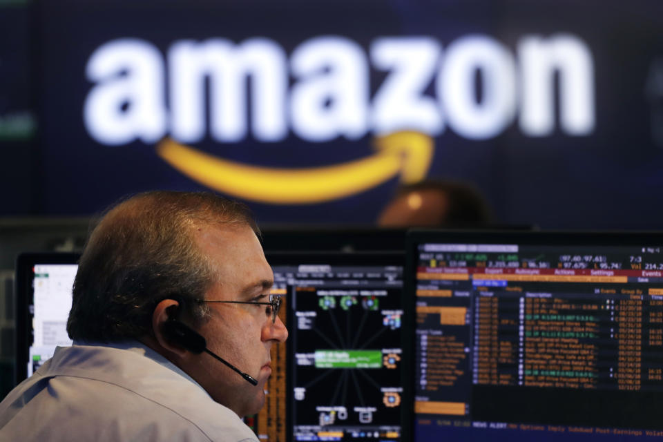 FILE- In this Sept. 4, 2018, file photo a Nasdaq employee monitors market activity in New York. Investors were ravenous for companies able to add customers and deliver fat growth. So they were willing to pay premium prices for an Amazon or a Netflix. Left behind were stocks in more staid industries, even if they had more attractive prices relative to their profits. (AP Photo/Mark Lennihan, File)