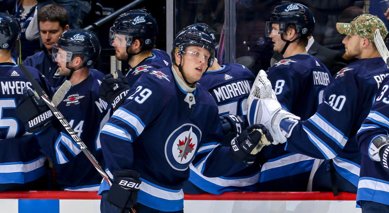 NHL players have the bench ‘drive-by’ goal celebration figured out. So, why is it so tough when nobody is in motion? (Photo by Jonathan Kozub/NHLI via Getty Images)