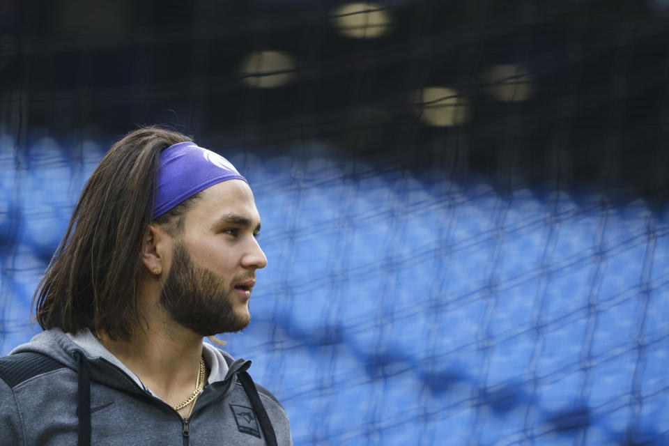 Toronto Blue Jays' Bo Bichette looks on during practice ahead of the baseball team's wild-card playoff game against the Seattle Mariners in Toronto, Thursday, Oct. 6, 2022. (Alex Lupul/The Canadian Press via AP)