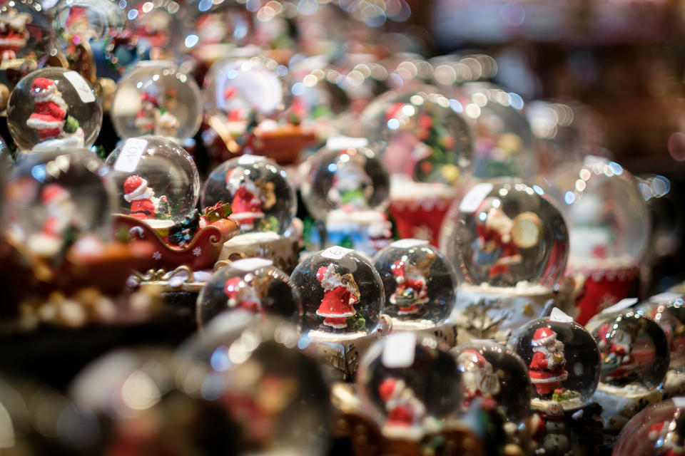 Snow globes displayed for sale at the Christmas Market on Dec. 21, 2021 in Aachen, Germany.<span class="copyright">Thierry Monasse—Getty Images</span>