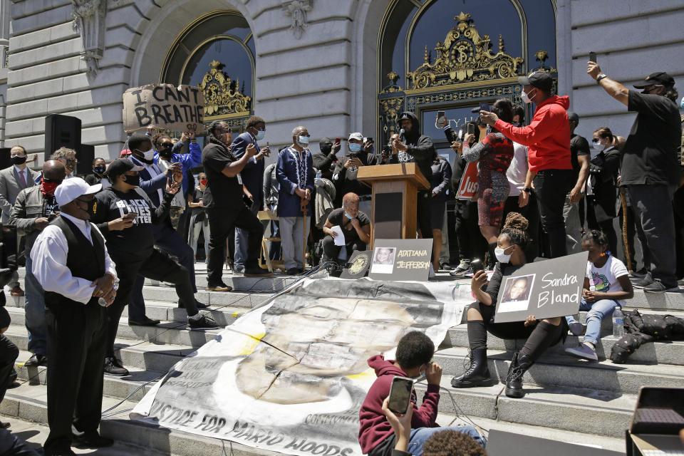 Jamie Foxx speaks to a large crowd during a "Kneel-In" to protest police racism on the steps of City Hall, Monday, June 1, 2020, in San Francisco. (AP Photo/Eric Risberg)