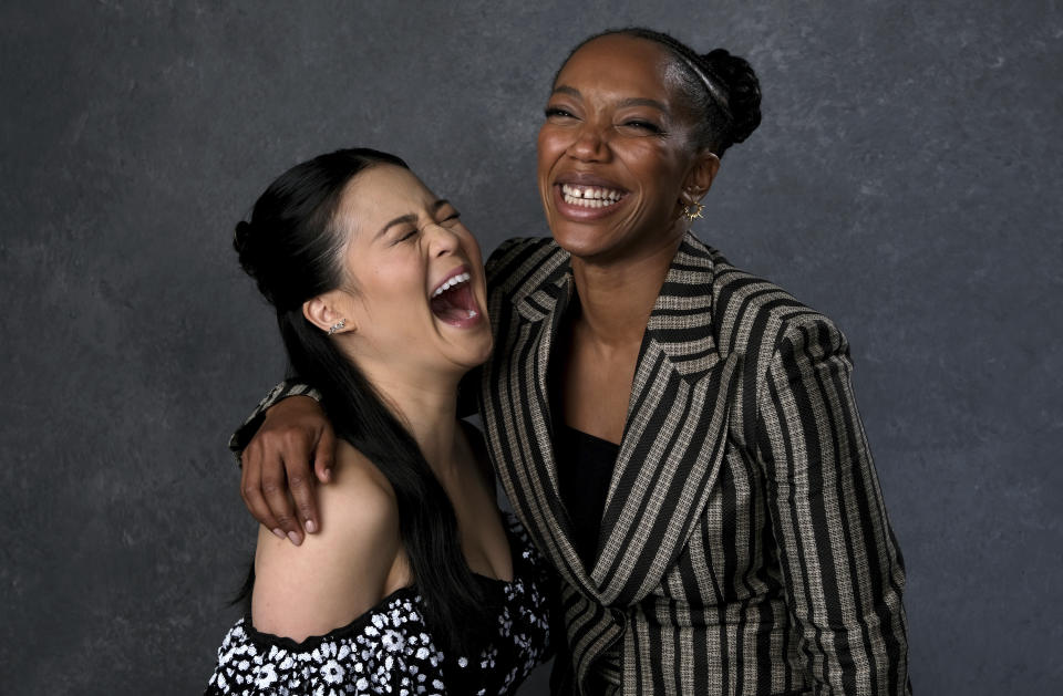 This Dec. 3, 2019 photo shows Kelly Marie Tran, left, and Naomi Ackie posing for a portrait to promote their film "Star Wars: The Rise of Skywalker" in Pasadena, Calif. (AP Photo/Chris Pizzello)