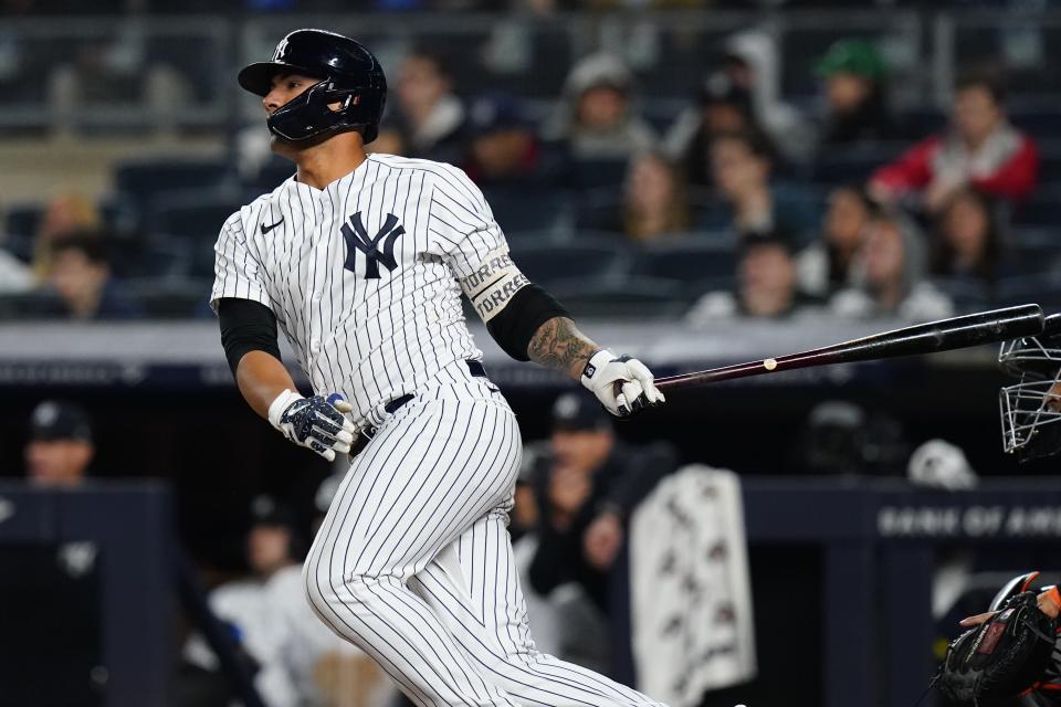 New York Yankees' Gleyber Torres follows through on a three-run triple during the seventh inning of a baseball game against the Baltimore Orioles, Tuesday, April 26, 2022, in New York. (AP Photo/Frank Franklin II)