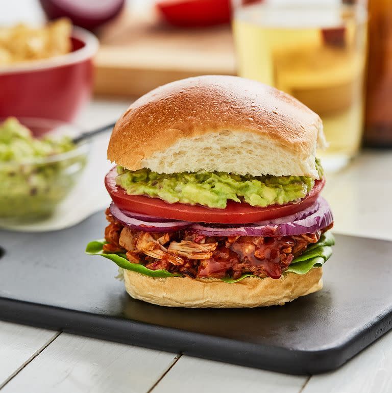 <p>This jackfruit burger is 100% <a href="https://www.delish.com/uk/vegan-recipes" rel="nofollow noopener" target="_blank" data-ylk="slk:vegan;elm:context_link;itc:0;sec:content-canvas" class="link ">vegan</a>, and 100% tasty. Made with pulled jackfruit, we've layered up a brioche bun with all the burger fillings, plus a tasty <a href="https://www.delish.com/uk/cooking/recipes/a29947768/best-ever-guacamole-recipe/" rel="nofollow noopener" target="_blank" data-ylk="slk:guac;elm:context_link;itc:0;sec:content-canvas" class="link ">guac</a>. </p><p>Get the <a href="https://www.delish.com/uk/cooking/recipes/a31093320/jackfruit-burger/" rel="nofollow noopener" target="_blank" data-ylk="slk:Vegan Pulled Jackfruit Burger;elm:context_link;itc:0;sec:content-canvas" class="link ">Vegan Pulled Jackfruit Burger</a> recipe.</p>