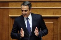 Greek PM Mitsotakis presents his government's main policies during a parliamentary session in Athens