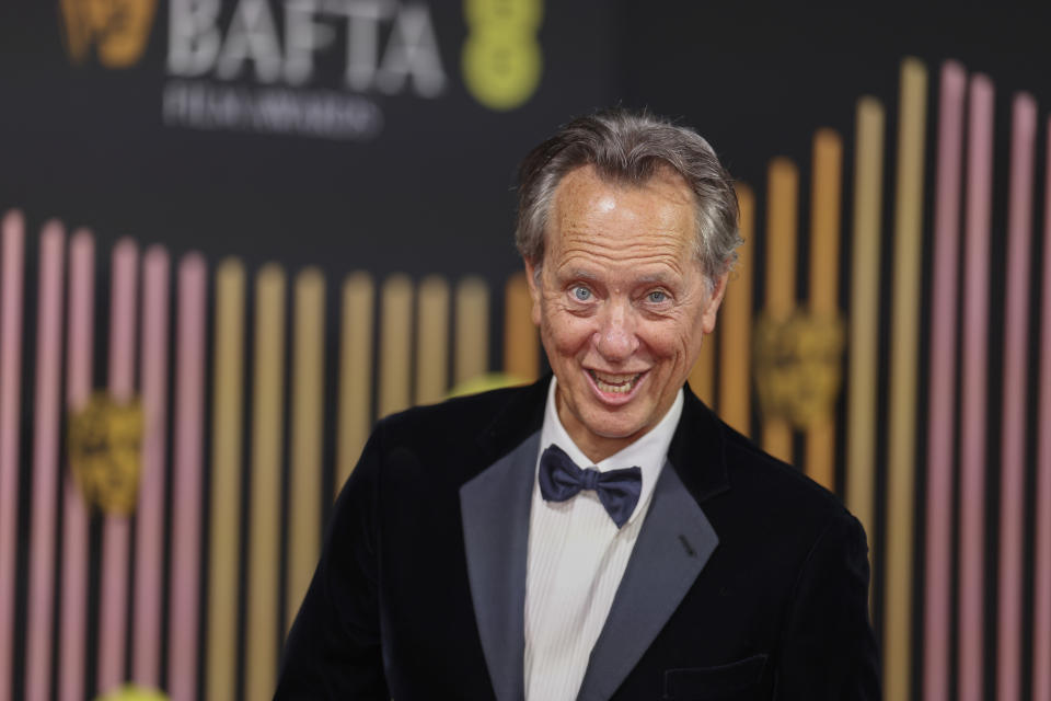 Richard E. Grant poses for photographers upon arrival at the 77th British Academy Film Awards, BAFTA's, in London, Sunday, Feb. 18, 2024. (Photo by Vianney Le Caer/Invision/AP)