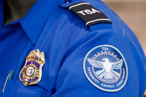 PHOTO: A Transportation Security Administration officer works at Dallas Love Field Airport on June 24, 2020, in Dallas. (Tony Gutierrez/AP, FILE)