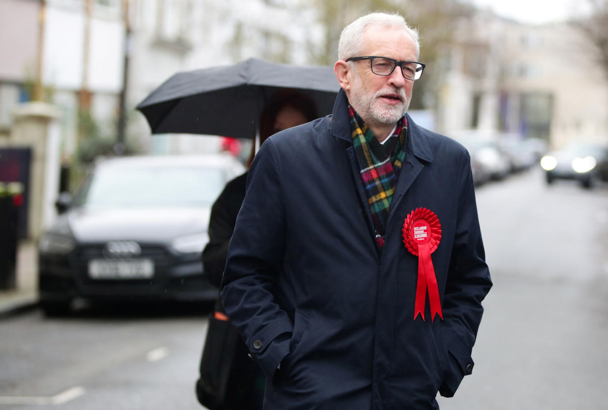 Britain's opposition Labour Party leader Jeremy Corbyn walks to a polling station to vote in the general election in London, Britain, December 12, 2019. REUTERS/Lisi Niesner