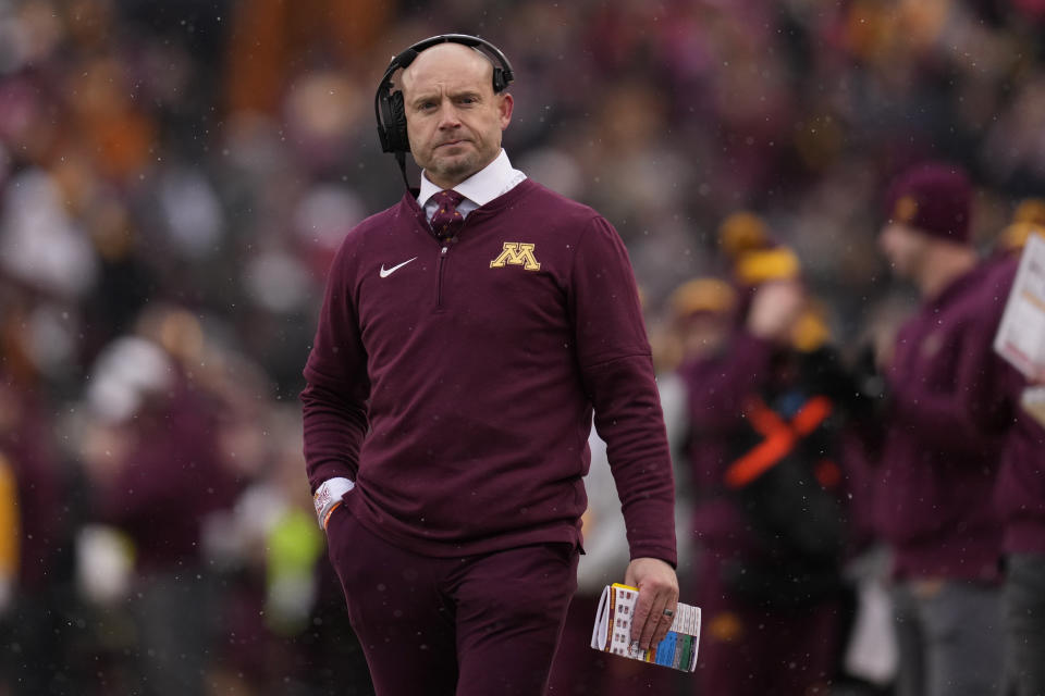 Minnesota head coach P. J. Fleck stands on the sideline during the first half of an NCAA college football game against Wisconsin, Saturday, Nov. 25, 2023, in Minneapolis. (AP Photo/Abbie Parr)