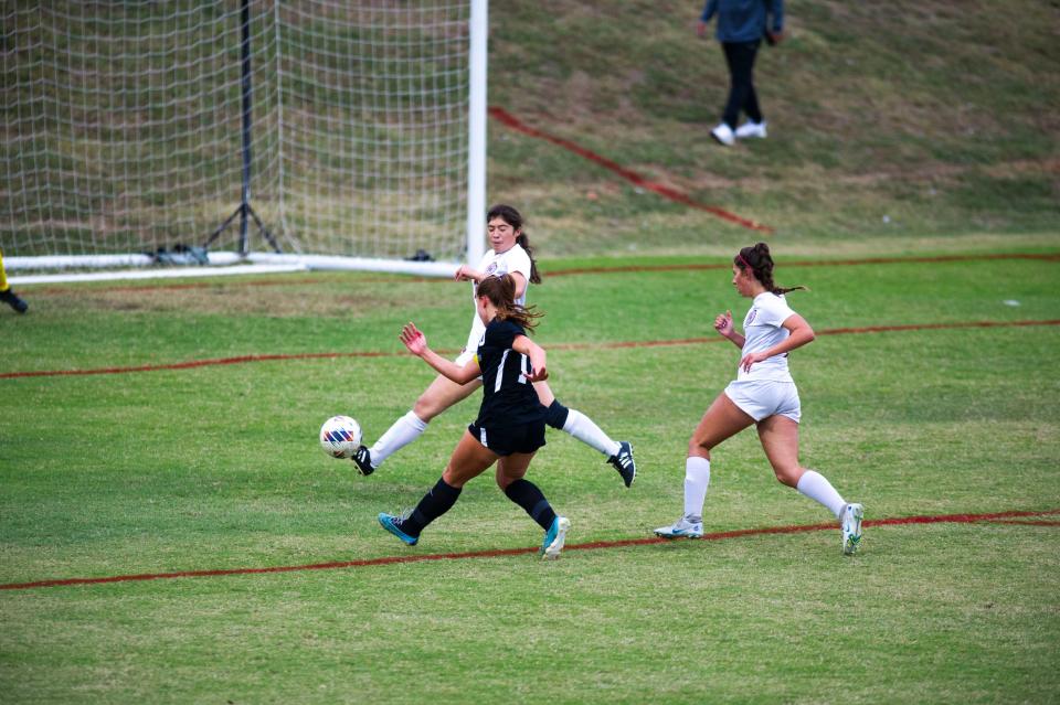 Bearden's Breana Mendoza (10), a University of Dayton signee, kicks the ball during the Class AAA Region 2 tournament Oct. 17.