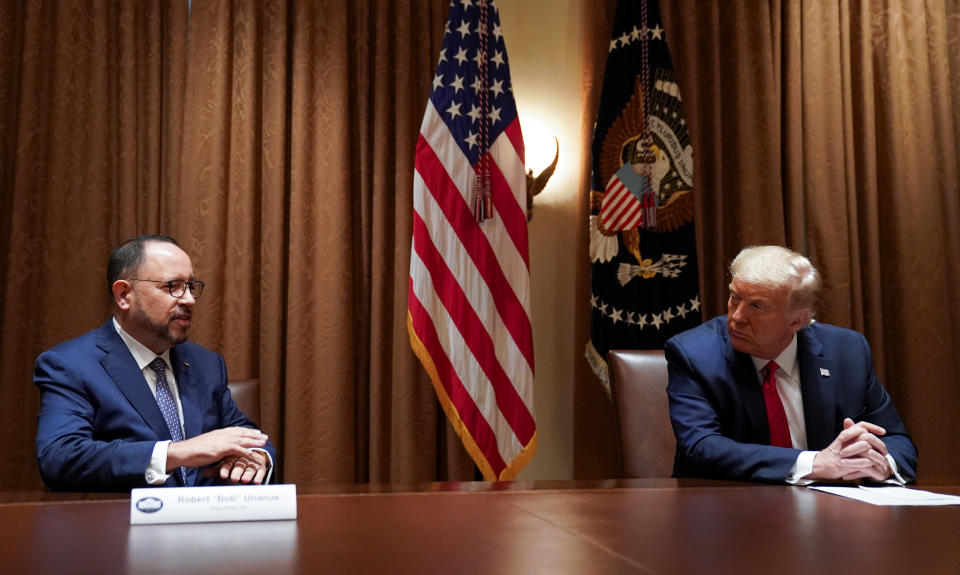 U.S. President Donald Trump listens to remarks from Robert Unanue, CEO of Goya Foods, prior to signing an Executive Order on the White House Hispanic Prosperity Initiative at the White House in Washington, U.S., July 9, 2020. Picture taken July 9, 2020. REUTERS/Kevin Lamarque