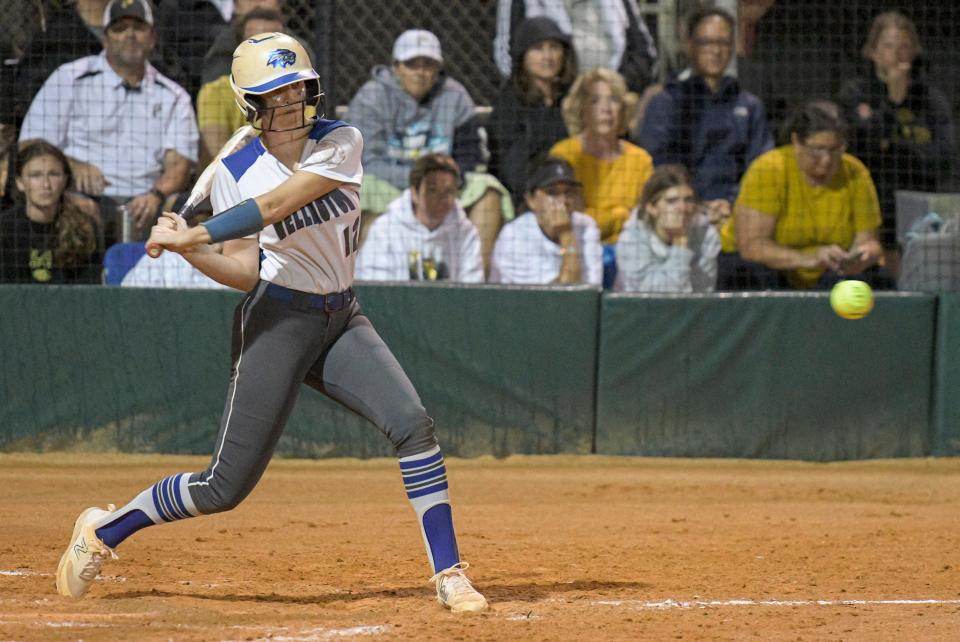 Wellington's Kaylee Riles (12) bats in a runner at the Class 7A state semifinal game between Wellington High School and (Tampa) Plant High School at Legends Way Ball Fields in Clermont on Friday, May 26, 2023. [PAUL RYAN / CORRESPONDENT]