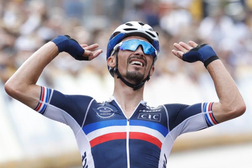 Julian Alaphilippe successfully defended his road race title at the World Road Cycling Championships (Olivier Matthys/AP) (AP)