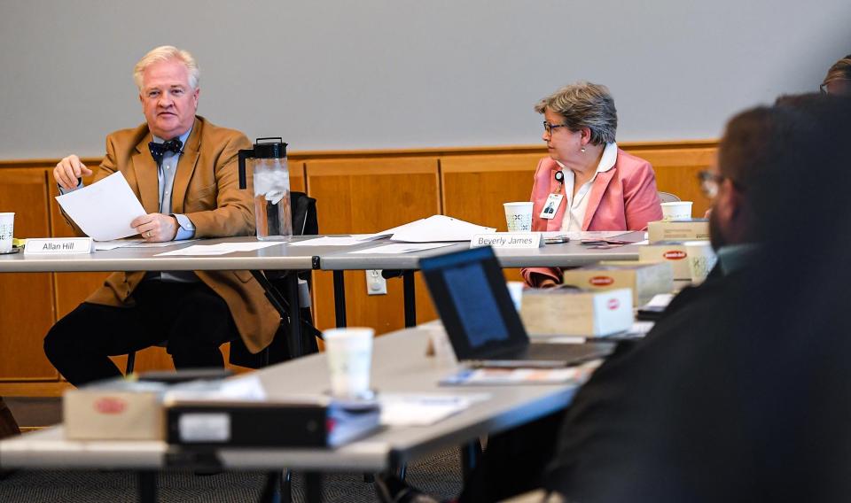 Executive Director Beverly James, right,  looks toward Board of Trustees Chairman Allan Hill during the Greenville County Library Board of Trustees meeting at the Hughes Main Library in Greenville, S.C. Monday, December 5, 2022.