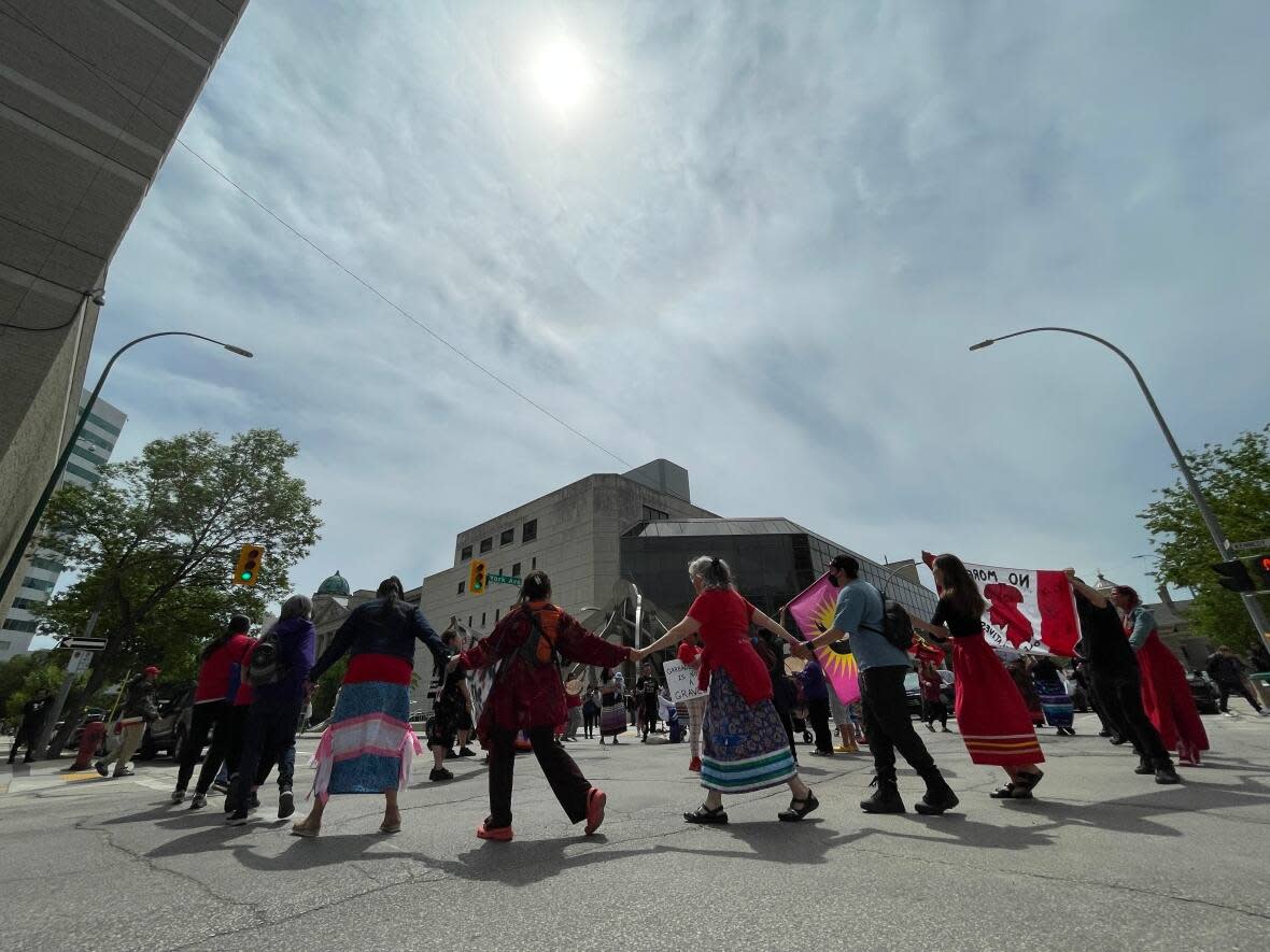 A rally and round dance was held outside of the Winnipeg law courts on Monday afternoon as the trial of admitted serial killer Jeremy Skibicki ended. (Trevor Brine/CBC - image credit)