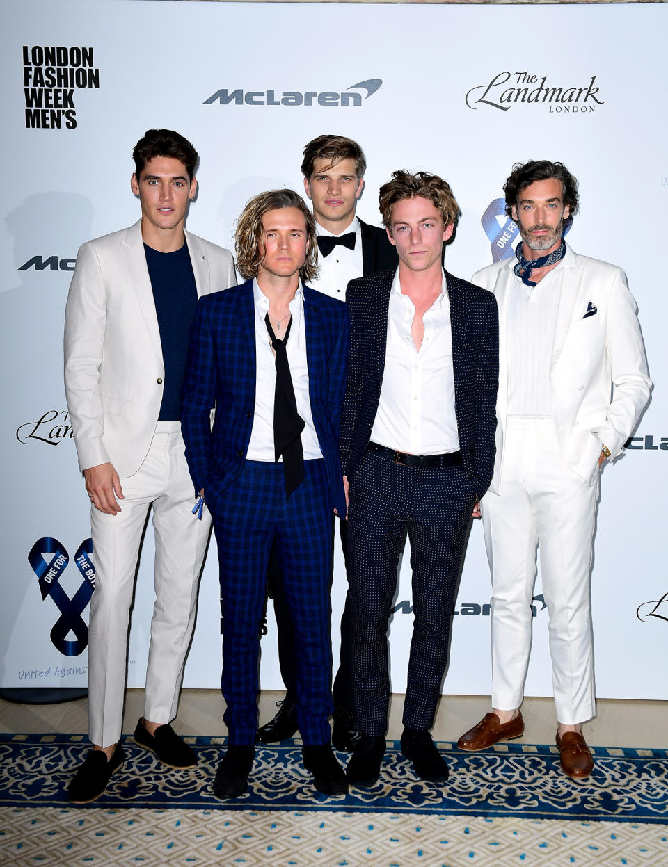 <p>The fivesome wore a range of suits, with McFly’s Dougie Poynter looking slightly disheveled in a loosely-fastened tie. <br><em>[Photo: PA]</em> </p>