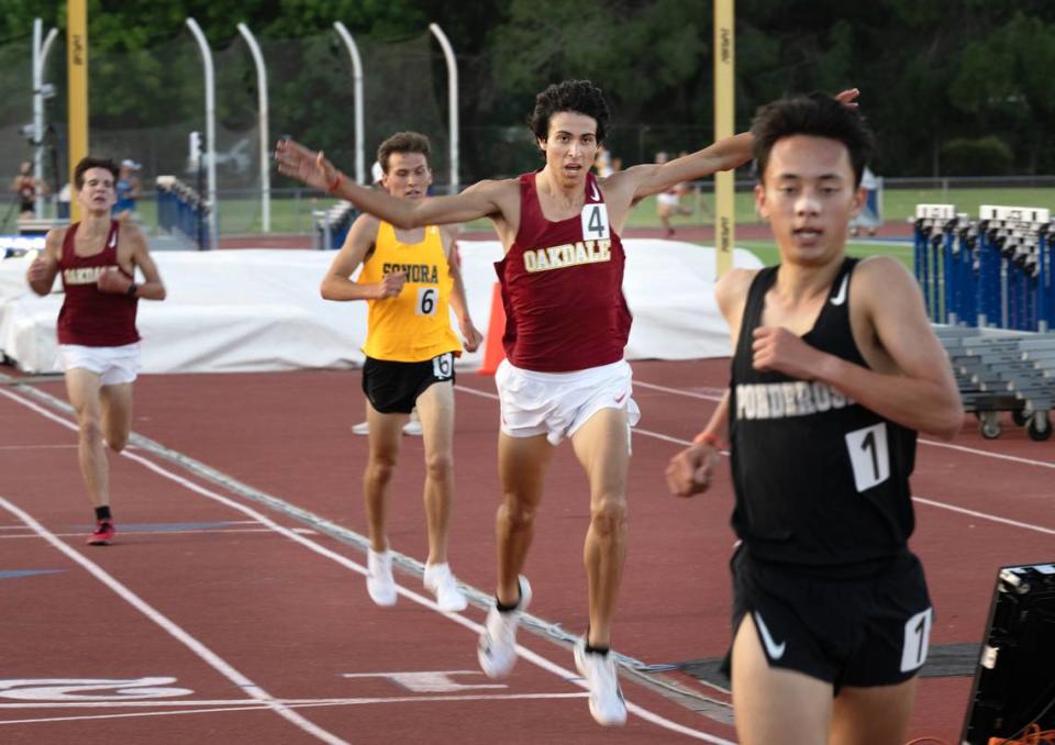 Oakdale’s Omar Alsaidi (4) finishes second behind Josh Chu of Ponderosa at the CIF Sac-Joaquin Section Masters Track Championship at Davis High School in Davis, Calif., Saturday, May 18, 2024. Alsaidi had a time of 9:09.10 behind first place finisher Chu at 9:07.25. Sonora’s Broen Holman (6) was third at 9:10.09.