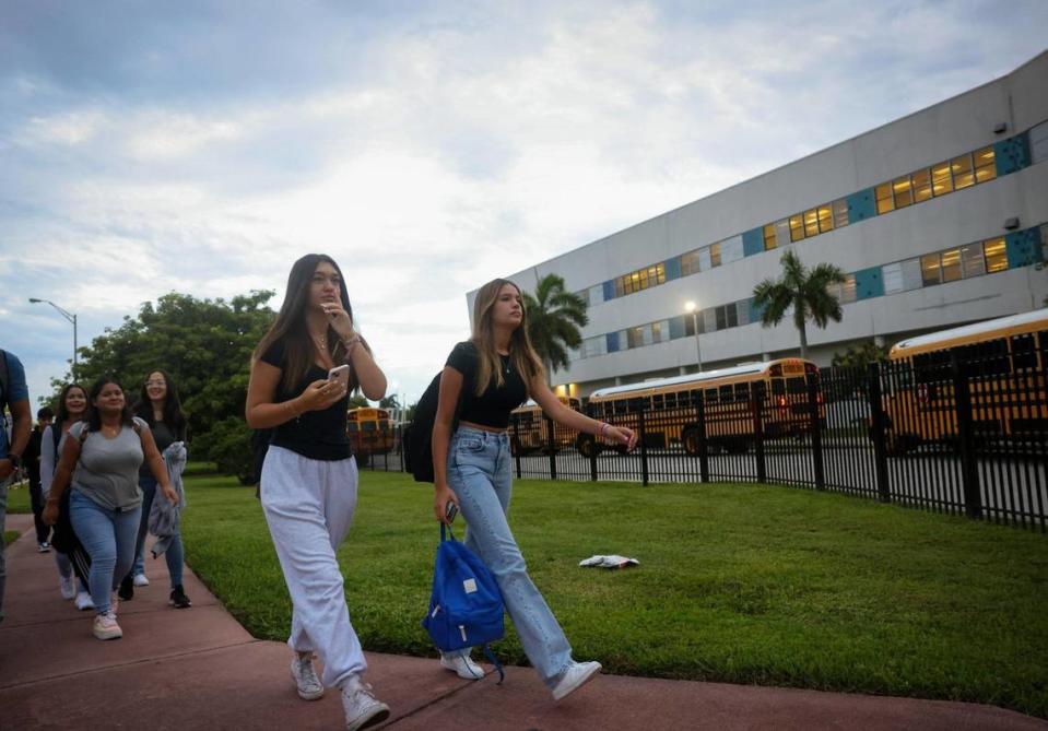 Students from Miami Beach Senior High walk into their first day of school on Thursday, Aug. 17, 2023, in Miami Beach.