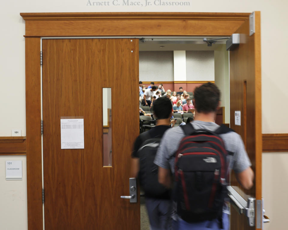Students enter a classroom at the University of Georgia (Joshua L. Jones / Athens Banner-Herald via AP file)