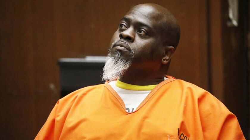 LOS ANGELES, CA - JUNE 01, 2018: Cleamon Johnson aka "Big Evil" looks at his defense attorney Robert Sanger during a court appearance before Superior Court Judge Curtis Rappe at the Criminal Courts Building in Los Angeles on June 1, 2018. Johnson is a co-defendant with Michael Allen in long-running murder case..