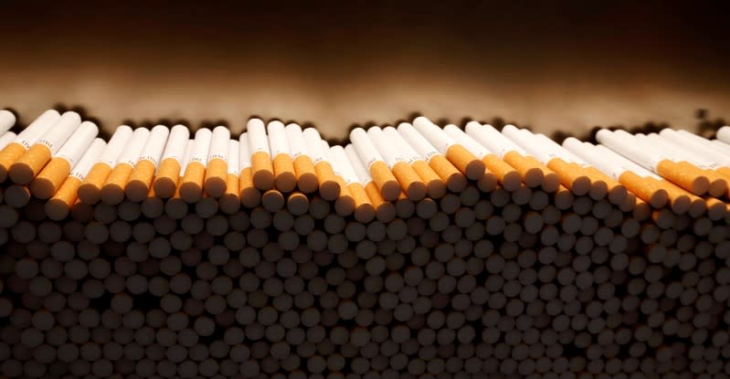 FILE PHOTO: Pall Mall cigarettes are piled during the manufacturing process in the British American Tobacco Cigarette Factory (BAT) in Bayreuth