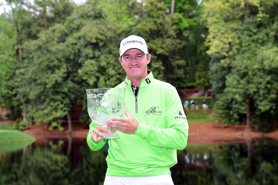 Jimmy Walker holds the winner's trophy after the Par 3 Contest prior to the start of the 2016 Masters Tournament, GettyImages-519446522