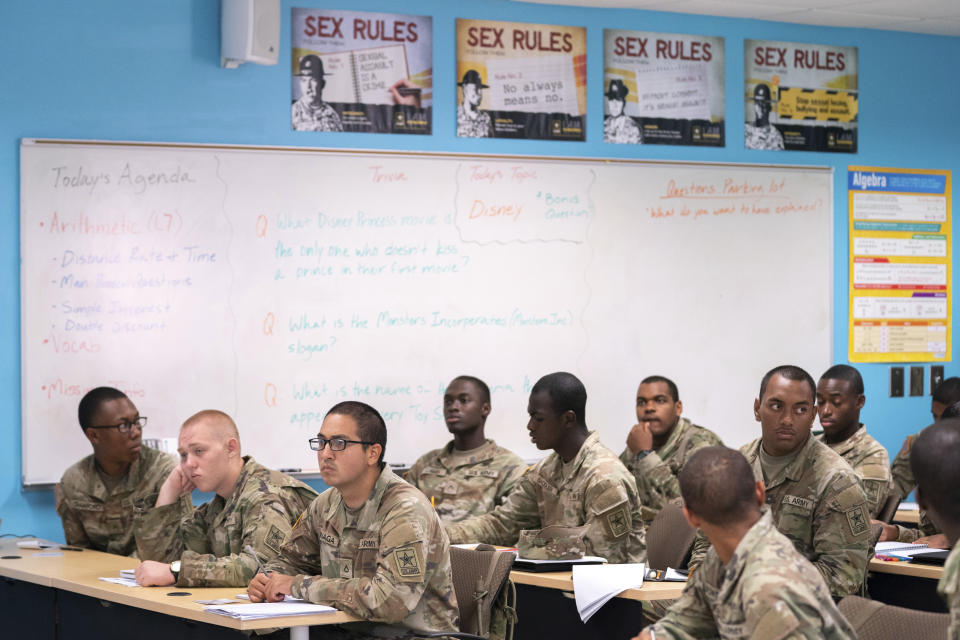 FILE - Students in the new Army Prep Course sit at desks at Fort Jackson in Columbia, S.C., Aug. 26, 2022. (AP Photo/Sean Rayford, File)