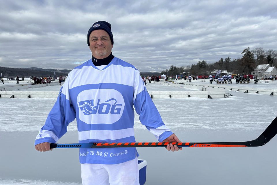 Pond Hockey Classic player Pete Kibble poses for a photo in Meredith, N.H., on Friday, Feb. 2, 2024. Like many winter traditions on lakes across the U.S., pond hockey is under threat from climate change. (AP Photo/Nick Perry)