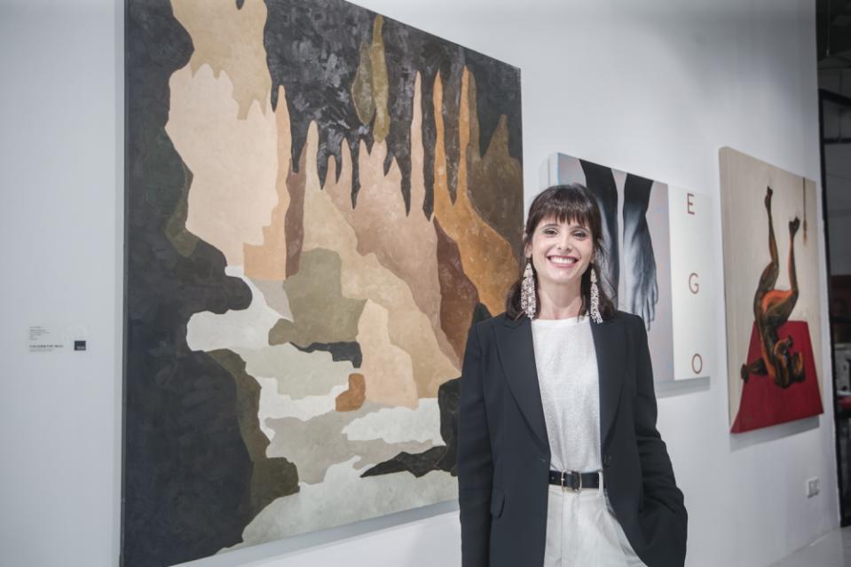 Kika Goldstein, a Brazilian artist with German-Jewish heritage, displays her 'Return to the Cave' painting at the Colours for Gaza exhibition. — Picture by Raymond Manuel