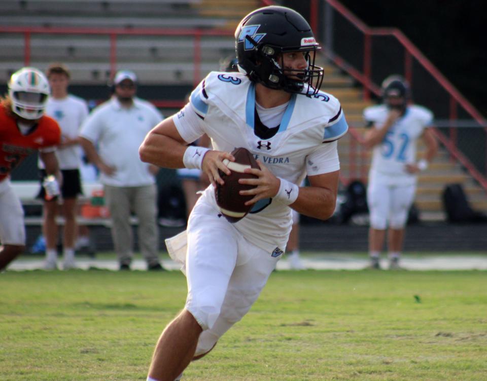 Ponte Vedra quarterback Ben Burk (3) rolls out and looks to throw against Mandarin during a high school football preseason kickoff classic on August 18, 2023. [Clayton Freeman/Florida Times-Union]