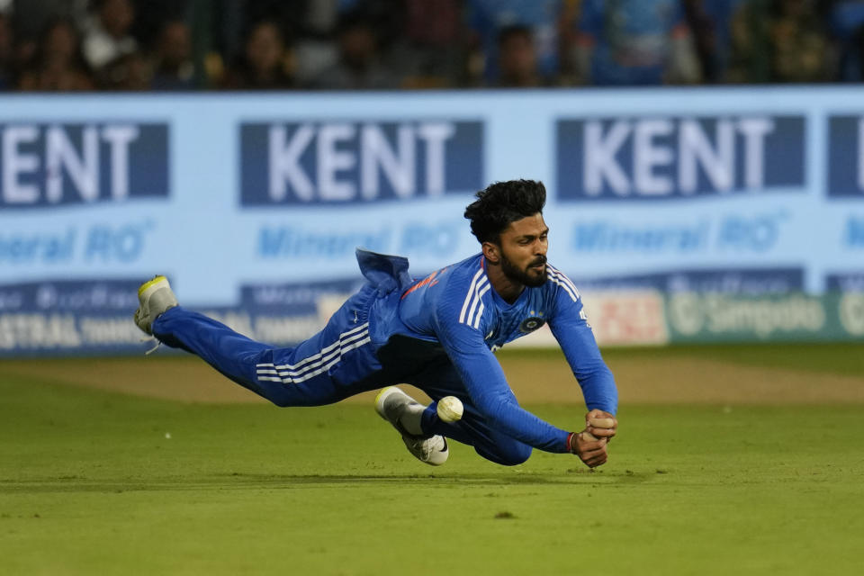 India's Ruturaj Gaikwad fails to take the catch of Australia's captain Matthew Wade during the fifth T20 cricket match between India and Australia in Bengaluru, India, Sunday, Dec. 3, 2023. (AP Photo/Aijaz Rahi)