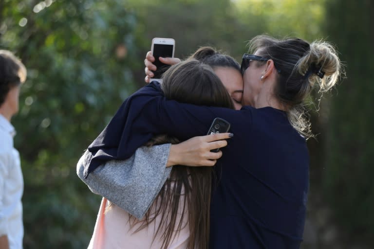 People pictured following a shooting at Tocqueville high school in the southern French town of Grasse on March 16, 2017