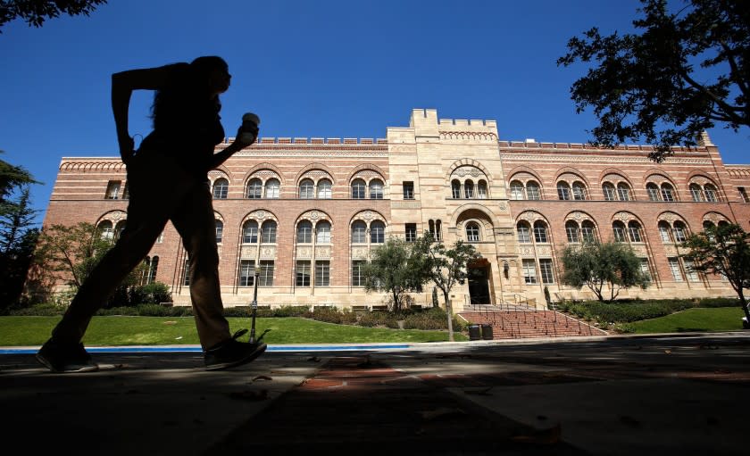 A pedestrian walks near the humanities building on the UCLA campus in Westwood in 2013.