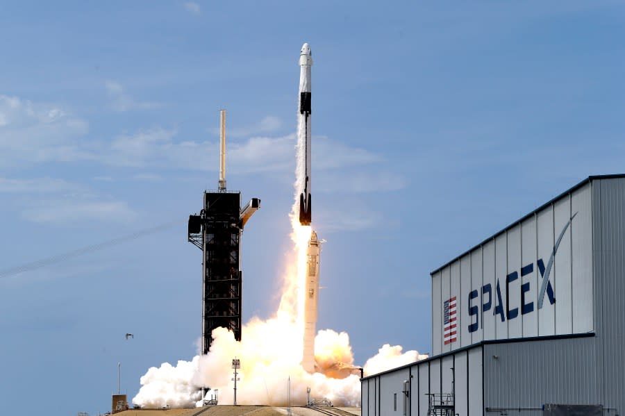 FILE – In this May 30, 2020, file photo, a SpaceX Falcon 9, with NASA astronauts Doug Hurley and Bob Behnken in the Dragon crew capsule, lifts off from Pad 39-A at the Kennedy Space Center in Cape Canaveral, Fla. For the first time in nearly a decade, astronauts blasted towards orbit aboard an American rocket from American soil, a first for a private company. (AP Photo/John Raoux, File)