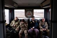 Ukrainian volunteer medics use a converted bus to transport wounded Ukrainian soldiers from the eastern frontline near Bakhmut to a hospital in Dnipro