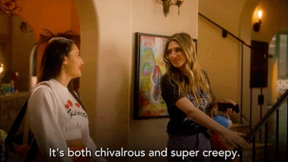 two women smiling at each other with the words "It's both chivalrous and super creepy"